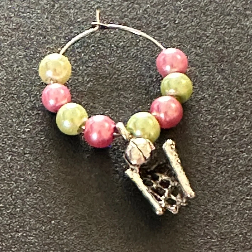 Wine glass tag, stainless steel hoop, green/pink beads, basketball charm